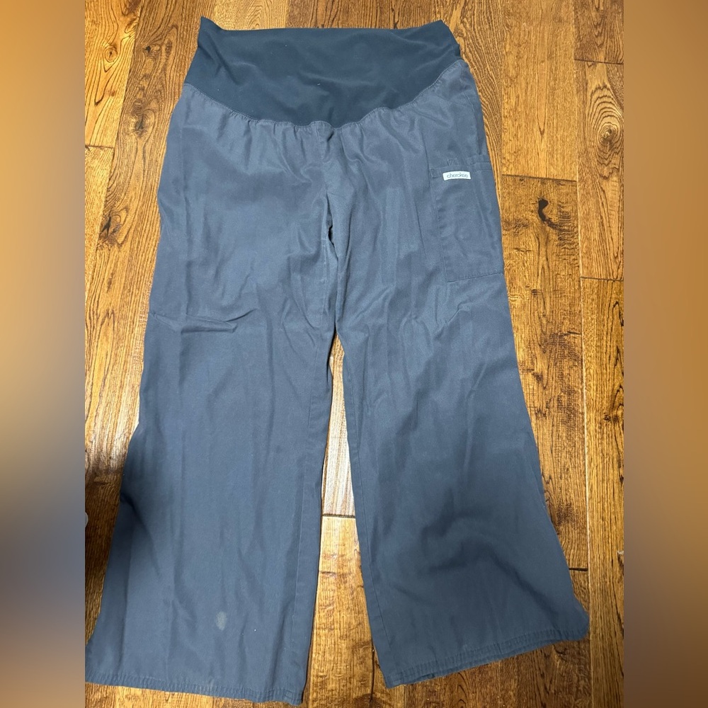 2 pairs of scrub pants and 1 top
